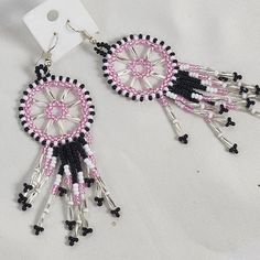 Handmade Beaded Wagon Wheel Chandelier Pierced Ears Pink Black White Beaded Ear Rings...Great Looking Hand Made Great Color And Shine...These Do Not Photograph Well Unfortunately.....These Sparkle And Shine In The Light....Brand New In Package...... Pink Round Beaded Earrings With Dangling Beads, Pink Jewelry With Adjustable Black Beads, Pink Beaded Earrings With Bead Caps, Pink Round Jewelry With Bead Caps, Pink Jewelry With Black Beads For Gift, Pink Beaded Dangle Earrings With Bead Caps, Pink Dangle Beaded Earrings With Bead Caps, Pink Beaded Earrings With Black Beads For Gift, Pink Dangle Beaded Earrings With Black Beads