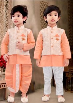 ABOUT THIS ITEM This is an exclusive Bollywood style Party wear,  Waistcoat Kurta, Pajama, Waistcoat, and Dhoti , White Pant Set for little boys. Fabric Details: Kurta, Pajama, and Dhoti Pant are made from Soft Silk , skin-friendly lining for the Kurta. Jacket is made with Brocade with lining. Occasion: Birthday gift, Festive wear, party/casual wear, wedding, and all special occasions. Age Group: 3 Months - 2 Years. Package Includes :  4 pieces ( 1 Kurta +1 Dhoti + 1 White Pant + 1 Waistcoat )  Shipping: Flat shipping rate within the US via USPS. Wash care Instructions: Do not bleach, Iron at low heat, and Dry Clean only. For best fitting, please take measurements for your child and refer to the size chart in the last picture before purchase. This designer wear is made with brocade silk fe Long Sleeve Sets For Puja And Festivals, Long Sleeve Sets For Navratri Puja, Festive Long Sleeve Pant Set For Navratri, Long Sleeve Sets For Diwali Celebration, Navratri Puja Sets With Long Sleeves, Long Sleeve Sets For Eid Celebration, Eid Celebration Long Sleeve Sets, Sleeveless Sets For Festivals And Celebrations, Traditional Sleeveless Pant Set For Festive Season