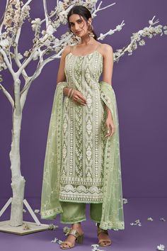 Create an opulent effect with your fashion sense by wearing this elegant pista green color kameez made of net material that comes with banglory silk inner embellished with cotton thread lucknowi work and sequins work all over. #EmpressClothing #Salwarkameez #SalwarSuit #lucknowikurti #lucknowichikankari #chikankari #chikankarikurta #chikankariembroidery #chikankarikurti #chikankarisuit #chikankariwork #PartyWear #partywearsuits #WeddingWear #festivalwear #festive #diwalioutfit #diwalishopping # Cotton Thread Embroidery, Pista Green, Cotton Decor, Traditional Suit, Indian Suits, Fancy Dress Design, Salwar Kameez Designs, Stylish Dress Book, Thread Embroidery