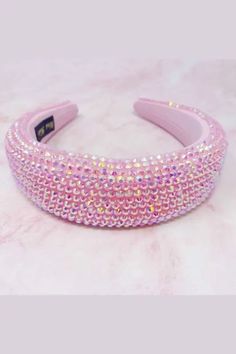 The Millennium Shine Puffy Headband will add dazzling flair to your look. Its cushy body and iridescent sparkles reflect beautiful colors and shines, making it an eye-catching statement piece. Perfect for both everyday fun and special occasions.Soft and light, comfortable to wearDimensions: approximately 6.5" x 6.5" x 1.75"Made In: China Trendy Pink Headband Hair Accessories, Trendy Adjustable Pink Headband, Glamorous Adjustable Hair Accessories For Parties, Glamorous Party Headband, Trendy Pink Hair Accessories For Party, Trendy Adjustable Hair Accessories For Party, Trendy Party Headband, Trendy Party Hair Accessories With Matching Headband, Trendy Summer Party Headband