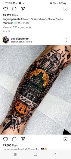 a person with a tattoo on their arm that has an image of a house in the background