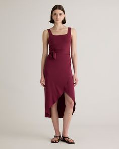 Upgrade your wardrobe with the Tencel Jersey Side Tie Dress, a luxurious and versatile piece that will make you feel confident and elegant for any occasion. Made from premium Tencel fabric, this dress offers a silky smooth texture that drapes beautifully over your curves. Simply pair it with your favorite sandals or heels and accessories for a complete look that's both comfortable and chic.  | Quince | Women's Tencel Jersey Side Tie Midi Dress in Wine, Size Small Elegant Viscose Midi Dress For Date Night, Sleeveless Evening Dress In Viscose, Summer Formal Viscose Dress, Elegant Sleeveless Asymmetrical Dress For Wedding Guest, Elegant Midi Length Viscose Wrap Dress, Elegant Viscose Dress For Date Night, Elegant Viscose Midi Wrap Dress, Elegant Viscose Party Dresses, Elegant Party Dresses In Viscose