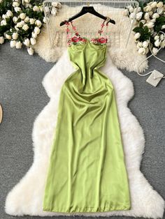 Elegant Green Satin Gown with Floral Embroidered Straps Evening Gown With Floral Embroidery In Green, Green Floral Embroidered Evening Gown, Sleeveless Satin Dress With Floral Embroidery, Spring Satin Dress With Floral Embroidery, Green Satin Dress For Spring, Fitted Green Gown With Floral Embroidery, Elegant Green Gown With Floral Embroidery, Green Floral Embroidered Party Gown, Green Floral Embroidery Party Gown