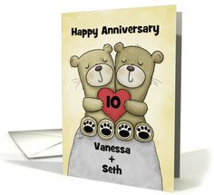 an anniversary card with two teddy bears holding a heart