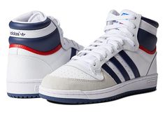 adidas Originals Top Ten Rb - Men's Shoes : White/Night Marine : Take on the daily game in style wearing the adidas Originals Top Ten Rb shoes. Leather upper. Textile lining. Ankle-length design. Padded collar. Logo detail on the outsole and heel. Signature three-striped pattern on the side. Lace-up closure for a snug fit. Rubber outsole. Imported. Measurements: Weight: 15 oz Product measurements were taken using size 8.5, width D - Medium. Please note that measurements may vary by size. Weight Leather High-top Striped Sneakers, Leather High-top Sneakers With Stripes, High-top Leather Skate Shoes With Three Stripes Branding, Urban Sneakers With Three Stripes And Round Toe, High-top Synthetic Skate Shoes With Three Stripes, White Lace-up High-top Sneakers With Three Stripes, Adidas High-top Sneakers With Round Toe, Adidas High-top Sneakers With Synthetic White Sole, High-top Synthetic Sneakers With Three Stripes Branding