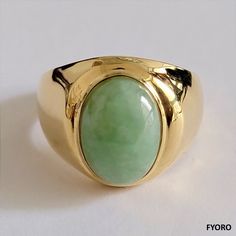 The 'Anyang Royal Spring Jade Ring' symbolizes the ancient Chinese city of Anyang, the birthplace of Chinese civilization 3000 years ago. This beautiful piece symbolizes strength and legacy through its robust and striking design.The Spring Jade is 100% non-dyed, natural Jadeite - straight from mother nature, cut to brilliance by our best Jadeite carvers.  Ring sizes available Specifications vary according to Ring Size. Typical specifications for Size US 10 are shown below (Ring as seen in the im Classic Jade Rings With Polished Finish, Modern Gold Ring With Large Stone, Modern Gold Rings With Large Stone, Classic Gold Rings With Jade, 14k Gold Ring With Large Stone, Gold Jade Ring With Polished Finish, Fine Jewelry Jade Rings With Polished Finish, Formal Gold Jade Rings, Heirloom Jade Rings In Yellow Gold