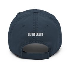 🌑 'Useless Corpse' Gothic Font Distressed Dad Cap 🌑 Embrace the darkly whimsical side of fashion with our 'Useless Corpse' Gothic Font Distressed Dad Cap. This unique cap is for those who wear their goth-inspired style with a hint of existential charm. Why it's perfect for your collection: Mysteriously Bold: Featuring 'Useless Corpse' in an enigmatic gothic font, this cap is a nod to the gothic subculture's fascination with the macabre and the philosophical. Rugged Distressed Look: Perfect for creating an edgy, lived-in feel, adding depth and character to your gothic ensemble. Comfort in Quality: Crafted from 100% cotton twill, it offers both durability and comfort, ideal for daily wear. One-Size Versatility: Designed to fit most, it ensures a comfortable fit, suitable for all genders. S Gothic Wardrobe, Gothic Font, Gothic Fonts, The Gothic, Dad Cap, Dad Caps, Gothic Style, Gothic Fashion, Charcoal Grey