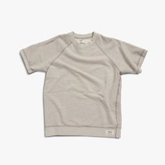 Made in the USA, our Short Sleeve Sweatshirt is crafted for comfort and style. Perfect for spring days and summer nights when there’s just a touch of chill in the air, this 100% cotton sweatshirt is sewn from American French Terry by Soft Goods Detroit. Available in sizes XS-XL. Shinola Detroit, Short Sleeve Sweatshirt, Sweatshirt Short Sleeve, Lifestyle Clothing, Sweater Coats, Grey Sweatshirt, Summer Nights, Heather Gray, French Terry