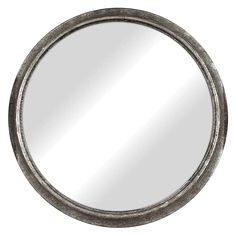 a round metal mirror on a white background