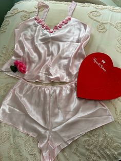 Feminine Satin Sleepwear Sets, Sweet Pink Sleepwear For Sleepover, Pink Sweet Sleepwear For Bedtime, Sweet Pink Sleepwear For Bedtime, Cute Pink Pajama Shorts For Pajama Party, Pink Satin Sleepwear For Lounging, Pink Satin Sleepwear For Nightwear, Pink Satin Loungewear Sets, Coquette Satin Sleepwear