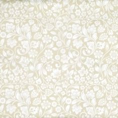 a beige and white floral wallpaper pattern