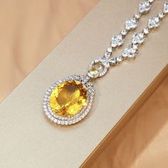 ✰ The big shiny yellow zirconia gemstones makes the necklace with halo more sparkly and graceful  ✰ This delicate lab-created handmade yellow gemstone necklace is perfect for people who want to achieve a brilliant and splendid look ✰ This gem necklace not only suitable for formal occasions such as banquets, weddings, theme parties, but also for everyday wear ✰ This gemstone necklace is a very special gift for birthday, Mother's Day, Valentine's Day and more  ✰ Comes with an exquisite gift box We also offer the ring and earring from the same collection: https://www.etsy.com/listing/1236503255/yellow-zircon-ring-with-halo-yellow-oval https://www.etsy.com/listing/1215892768/yellow-drop-earring-yellow-oval-dangle Materials: Environmentally-friendly Copper Quantity: 1 Piece Pendant Size: 1.4 x Luxury Yellow Diamond Necklace Gift, Luxury Yellow Gold Necklace With Sparkling Stones, Luxury Yellow Necklaces With Diamond Accents, Luxury Yellow Necklace With Diamond Accents, Formal Yellow Diamond Necklace Fine Jewelry Style, Formal Yellow Necklace With Brilliant Cut, Oval Diamond Necklaces For Party, Luxury Yellow Necklace With Brilliant Cut, Formal Yellow Diamond Necklace