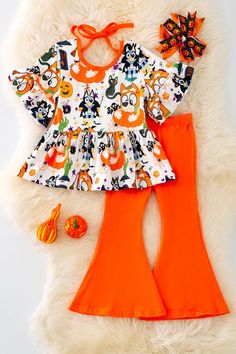 Ready to ship. Ships fast 1-3 business days Introducing our Halloween Bell Sleeve Tunic, the perfect addition to your festive wardrobe. With a playful printed design, this tunic features orange bells for a fun touch. Celebrate in style with this unique and comfortable piece that will have you standing out at any party. Jade Clothes, Country Baby Girl, Halloween Dogs, Bell Pants, Orange Pants, Baby Skirt, Girls Fall Outfits, Girls Halloween