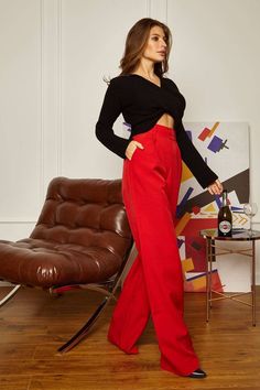 Wide leg pants with high waist underline the waist line and hide legs - perfect for women with Monica Bellucci type of figure. They fit perfectly, can be combined with crop tops, t-shirts and classic shirts. You can add a belt to finish the look. Our high waist pants can be worn on various occasions, including office work, business meetings, cocktail parties and late dinners. A worthy day-to-night pick. DETAILS - High waist pants - Wide legs - Two front buttons - functional pockets The crop top Red High-waisted Wide Leg Pants For Night Out, Red High-waisted Dress Pants For Formal, Red High-waisted Dress Pants For Formal Occasions, Party Dress Pants With Pockets Straight Leg, Party Dress Pants With Pockets And Straight Leg, Red High Waist Wide Leg Pants For Night Out, High-waisted Dress Pants With Pockets For Party, High Waist Red Formal Bottoms, Red High Waist Formal Pants