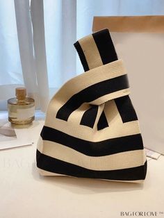 BagForLove - Korean Striped Print Crochet Bag - Fashionable Minimalist Tote Product Description Color Black and White Bag Size Mini Type Crochet Bags Style Fashionable Pattern Type Striped Composition 100% Polyester Material Polyester Size Chart INCH CM Bag Length Bag Width Bag Height Handle Height 7.9 inch 2.4 inch 9.4 inch 3.9 inch Bag Length Bag Width Bag Height Handle Height 20 cm 6 cm 24 cm 10 cm Similar Products h2 { text-align: center; } /* æ¢è¡ */ li{ white-space: normal; word-break: b Chic Canvas Pouch Bag, Black And White Bags, Minimalist Tote, Bags Style, Inch Bag, Crochet Tote, Color Black And White, Word Wrap, White Space