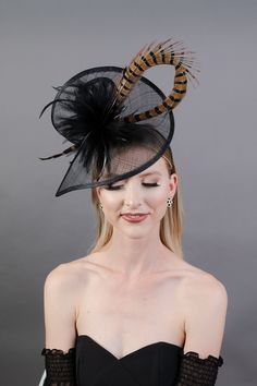 "Fascinator in BLACK with pheasant feather loop. Fastens with matching satin headband. Perfect for your wedding, church, horse races, formal events and tea parties! -Available in other colors -Light and comfortable to wear -Ready to ship -Group discount on 4 or more pieces Check out our men's tie collection! Find one to match your hat! Plain, floral and plaid bow ties and neck ties available here: https://www.etsy.com/shop/TheHatHive?ref=seller-platform-mcnav&section_id=18551844 I understand Blush Pink Fascinator, Horse Races, Tie Collection, Womens Tea, Pheasant Feather, Pink Fascinator, Black Fascinator, Plaid Bow Tie, Hat Wedding