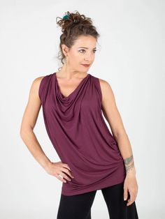 Loose, soft and comfy, our lightweight rayon jersey tunic is fitted at the hips and can be worn as a tunic with leggings, or bunched at the waist with jeans or any skirt or pants. This sophisticated top drapes well on a variety of figures. Classy enough for the office under a jacket or on it's own. [#details] Size Suggestions S/M: 2-6 M/L: 8-12 [/details] [#fabric] Lightweight Rayon Lycra: 90% Rayon (Viscose) / 10% Spandex (Lycra) [/fabric] Stretch Viscose Tops For Loungewear, Slouchy Tops For Loungewear, Versatile Flowy Tops For Loungewear, Versatile Viscose Tops For Loungewear, Casual Stretch Cowl Neck Tops, Versatile Stretch Blouse For Layering, Stretch Lagenlook Tops For Fall, Stretch Viscose Tops For Layering, Summer Cowl Neck Top