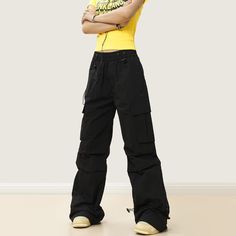 5ft 4''(163cm) tall, 97 lbs(44kg) weight and wearing a size M - Wide straight fit- Adjustable waist- Side pocket- 2 colors Sporty Solid Color Straight Leg Cargo Pants, Sporty Solid Straight Leg Cargo Pants, Straight Leg Pants For Streetwear, Full Length Work Pants With Hip Pockets For Streetwear, Solid Bottoms With Belt Loops For Streetwear, Sporty Straight Leg Pants With Belt Loops, Sporty High-waist Pants With Hip Pockets, Solid Color High-waisted Pants For Streetwear, Urban Full-length Bottoms With Belt Loops