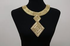 Magnificent vintage gold DIY beaded sew on collar applique bib necklace Great to be sewn on to your dress. Can also add a ribbon to transform into a a collar necklace with a bow tie Please check out my shop for many more collar bibs. Any questions feel free to ask. Elegant Gold Choker Bib Necklace, Gold Bib Necklace Choker, Gold Bib Necklaces For Wedding, Embellished Gold Jewelry For Festival, Gold Beaded Choker For Parties, Gold Beads Choker For Party, Elegant Gold Choker For Festivals, Handmade Gold Bib Necklace Shaped As A Choker, Handmade Gold Bib Necklaces For Festivals