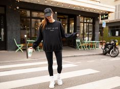 Our Minimalistic 'C'est La Vie' Sweatshirt is a symbol of timeless French elegance and a celebration of the iconic Parisian phrase. With a design that emphasizes simplicity and style, this sweatshirt is perfect for those who appreciate the beauty of minimalism. Choose between black or white text to suit your personal taste. "C'est La Vie" takes center stage, serving as a reminder to embrace life's ups and downs with grace and a sense of nonchalance. Underneath this iconic phrase, "Paris" adds a Equestrian Shirt, Sports Sweatshirt, Equestrian Girls, Christian Sweatshirt, Black Crewneck, Game Day Shirts, Sports Sweatshirts, Gildan Sweatshirts, Comfy Sweatshirt