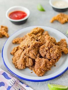 some fried food on a plate with sauce