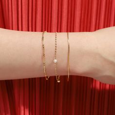 This Freshwater Pearl Delicate Chain Bracelet is the perfect way to channel your inner little mermaid! Strung with dainty pearls and a delicate chain, you'll be sure to make a splash wherever you go! The perfect accessory for those who love to add a touch of grace and elegance to their look! Gold Vermeil or Sterling Silver, Freshwater Pearl SKU: SAB-0028 Dainty Pearl Bracelet With Pearl Charm For Parties, Dainty Pearl Chain Bracelets For Party, Delicate Pearl Chain Bracelets For Party, Dainty Pearl Chain Bracelet For Party, Dainty Pearl Chain Bracelet With Jubilee Style, Dainty Oyster Bangle Chain Bracelet, Dainty Metal Pearl Bracelet Perfect As A Gift, Dainty Metal Pearl Bracelet As Gift, Dainty Pearl Bracelet As Gift