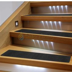 an image of some stairs with lights on them