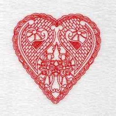 a red heart with an intricate design on the front and side, surrounded by smaller hearts