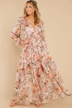 Our Prosperous Floral Chiffon Boho Maxi Dress is so flowy and free! This ivory dress features mustard. blush. pink. sage. orange. and fuchsia florals. An adjustable slip lining finishes this piece. Styled with the Indigo Twisted Hoops. Chloe Mini Necklace. Compass Coin Necklace. Maxi Cardigan, Sheer Skirt, Party Dress Long Sleeve, Floral Print Maxi Dress, Puff Sleeve Dresses, Floral Print Maxi, Boho Maxi, Party Dress Long, Floral Chiffon