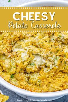 cheesy potato casserole in a white dish with tortilla chips on the side