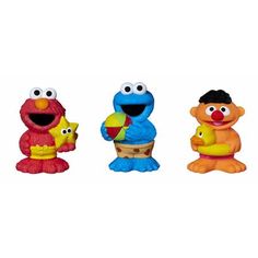 three sesame street characters standing next to each other in front of a white background,