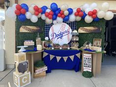 a baseball themed party with balloons and decorations