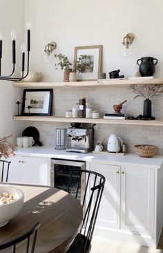 the kitchen is clean and ready to be used for breakfast or dinner time, but it's not too crowded