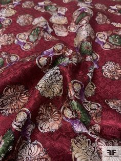 a red and green floral print fabric