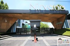 the entrance to an office building with a sign above it that reads nirvono