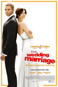 a man and woman standing next to each other in front of a poster for wedding marriage