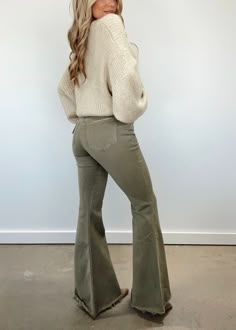 Indulge in luxury with our Olive Super Flare Jeans. High waisted for comfort and an elongated silhouette, with a soft and trendy flare fit for an elevated and chic look. Perfect for a brunch date, dinner, or drinks, these jeans effortlessly exude class and style. Button and zipper closure adds a touch of sophistication. 100% Cotton Hand wash cold. Green Thanksgiving Outfit, Army Green Flare Pants Outfit, Olive Flare Pants Outfit, Olive Long Sleeve Shirt Outfit, Women’s Flare Jeans Outfit, Green Flare Jeans Outfit, Outfits For 27 Year Old Women, Women Thanksgiving Outfit, Stitch Fix Outfits 2024