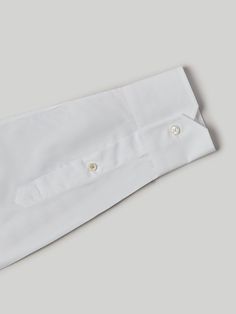 Designed in a modern fit, the Robert Talbott’s pinnacle dress shirt, the luxurious Craig Estate shirt is made in Italy and features our signature Monterey semi-spread collar with removable collar stays. Every construction detail, whether it’s the split back yoke or the lightweight pique neck channel, was explicitly chosen to enhance the way the shirt drapes, reduce bulk and optimize overall comfort.  So, whether you’re attending a board meeting as a lead investor or philanthropic adviser, this I Tailored Luxury Shirt For Workwear, Luxury Tailored Shirt For Work, Luxury Business Tops With Fold Down Collar, Luxury Business Top With Fold Down Collar, Luxury Spread Collar Shirt For Workwear, Luxury Fitted Dress Shirt With Button Closure, Designer Fitted Collared Dress Shirt, Designer Business Shirt With Fold Down Collar, Luxury Shirt With Fold Down Collar For Business