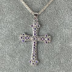 Sparkling Amethyst Set In A 925 Sterling Silver Cross With A 18 Inch Italian 925 Silver 2mm Rope Chain Necklace 1.75 Inch Tall Silver Cross Jewelry With Birthstone, Purple Spiritual Jewelry Stamped 925, Spiritual Purple Jewelry Stamped 925, Hallmarked Silver Amethyst Jewelry, Nickel-free Silver Amethyst Jewelry, Silver Amethyst Gemstone Jewelry, Purple Amethyst Cross Jewelry, Sterling Silver Jewelry With Purple Stone Setting, Purple Sterling Silver Jewelry With Stone Setting