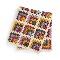 two crocheted squares on top of each other