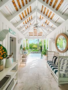 the inside of a house with white walls and ceilings