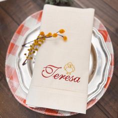 there is a napkin with the name teresa on it