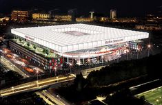 an aerial view of a stadium at night