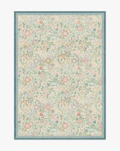 a floral wallpaper with blue border in the middle and pink, green, yellow and white flowers on it