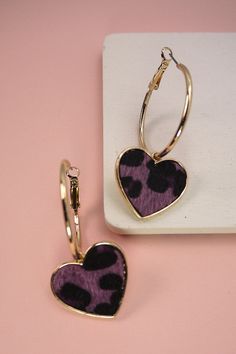 A fun hoop earring with a faux fur animal print heart charm.Size + FitDiameter: 1.25 "Decor: 1" Trendy Hoop Earrings With Heart Charm, Trendy Small Hoop Heart Earrings, Chic Leopard Print Jewelry, Trendy Leopard Print Dangle Jewelry, Fur Animal, Wall Accessories, Heart Charm, Faux Fur, Animal Print