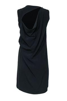 Get an elevated LBD with this modern marvel from Acne Studios! Made with a gathered side design, this is a minimalist and chic frock with some sultry back cutouts, so slip on some heeled boots for a downtown ready look. Size 4 (EU 36) 61% Viscose, 35% Acetate, 4% Elastane Fitted silhouette Gathered side design Round neckline Open back cutout with button Waist 31" Bust 36" Total length 35" Round Neckline, Acne Studios, Heeled Boots, Slip On, Black, Design