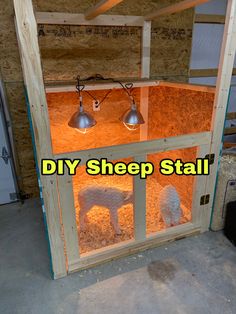 an open door with sheep in it and the words diy sheep stall