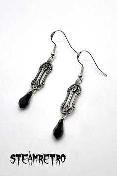 "These fantastic victorian style filigree earrings are part of our new Dark Gothic range, and are a step away from our previous steampunk work. There are numerous Gothic designers out there, and various marketplaces to purchase Gothic jewellery, but i am sure you will like what we are doing here Growing up in the 80's i lived through the \"goth\" movement, many a lost weekend was spent watching Bauhaus, Sisters, Nephilim etc, travelling to gigs all around the U.K, and one of the most interesting Victorian Black Pierced Earrings, Black Victorian Pierced Earrings, Antique Black Pierced Earrings, Earrings Goth, Gothic Jewellery, Earrings Gothic, Victorian Earrings, Steampunk Earrings, Goth Earrings