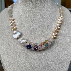 Discover the timeless beauty of our Elegant Harmony Gemstone and Pearl Necklace and Bracelet Set, a perfect fusion of sophistication and natural charm. Handcrafted with meticulous attention to detail, this exquisite set features an enchanting blend of freshwater pearls and multi-colored gemstones, creating a versatile and eye-catching addition to any jewelry collection. Details: Material: Freshwater pearls, assorted gemstones, gold-tone beads and clasps Necklace Length: 41 cm Bracelet Length: 19 Gemstone Colors, Bracelet Set, Timeless Beauty, Freshwater Pearls, Pearl Necklace, Necklace Lengths, Gold Tones, Jewelry Collection, Bracelet