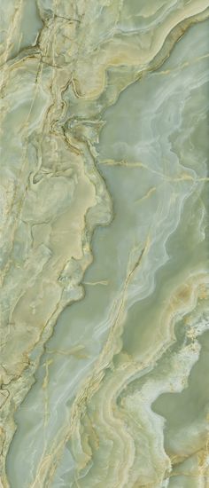 an image of a marble surface that looks like it has been painted green and gold